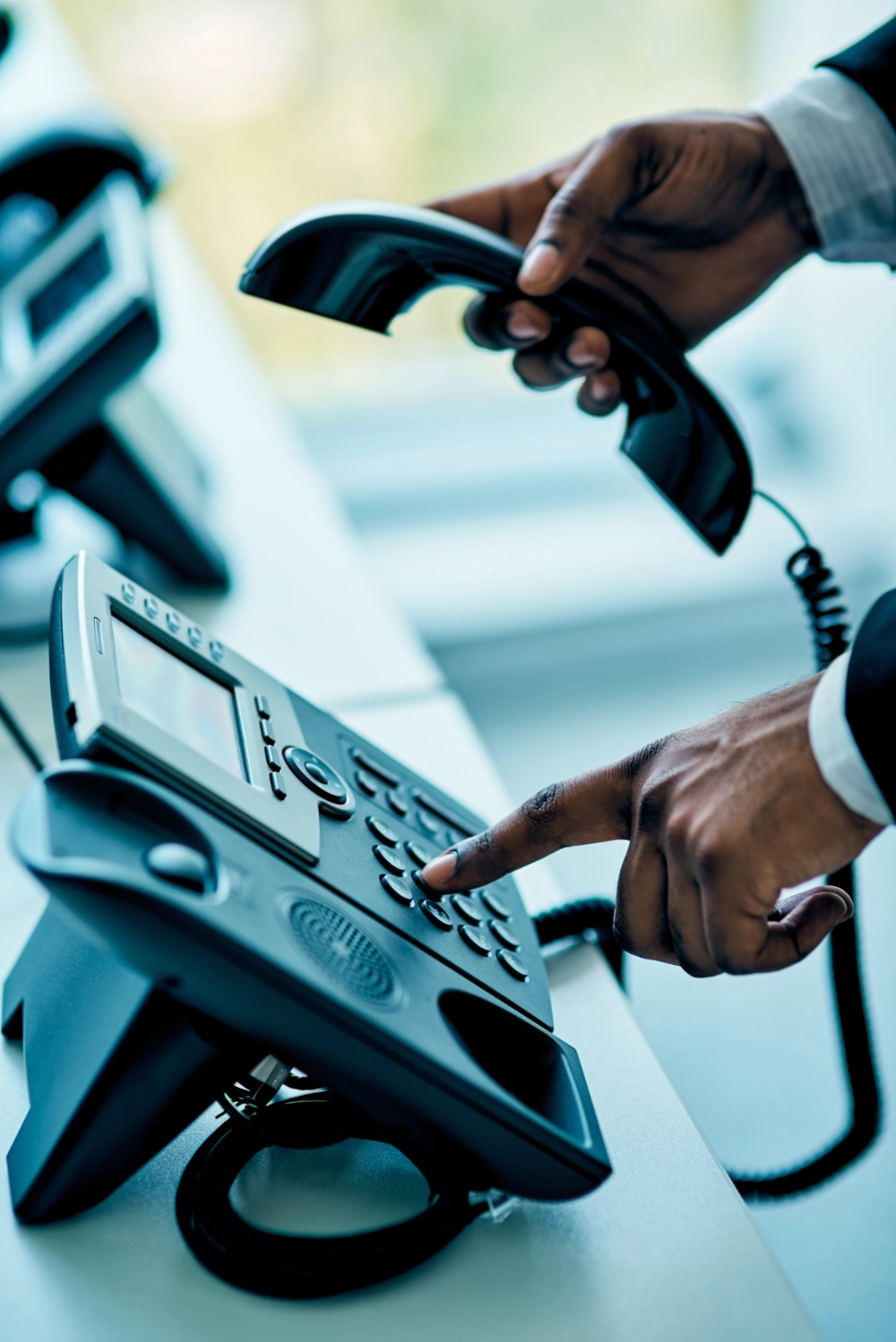 closeup-shot-of-unrecognizable-businessman-using-a-phone