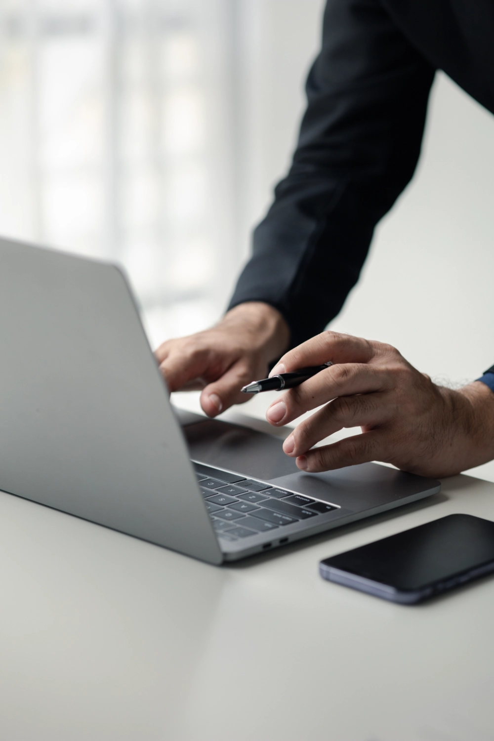 person-typing-on-laptop-keyboard